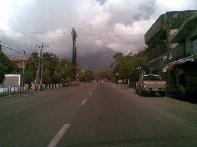 Deserted road in Camalig, Albay. The clouds are the tourists' worst enemy, blocking Mayon's perfect cone.